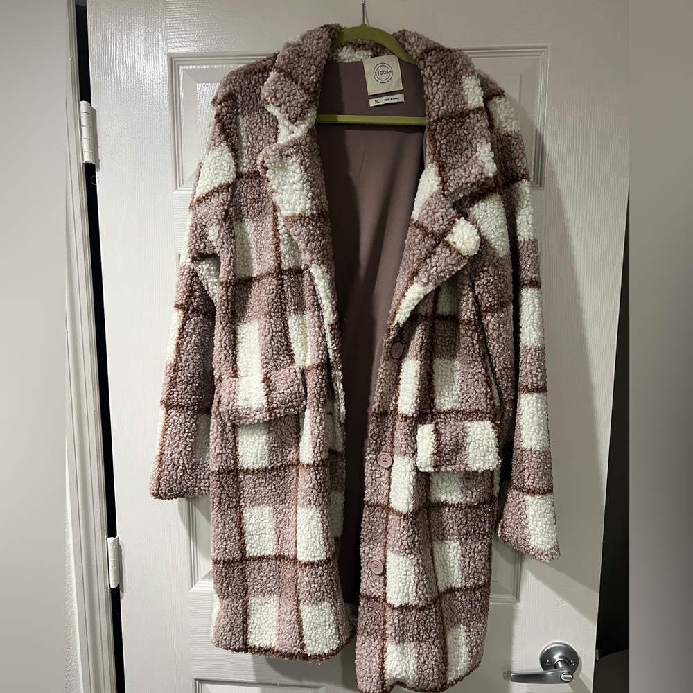 Pink plaid fluffy coat. Super cute on!